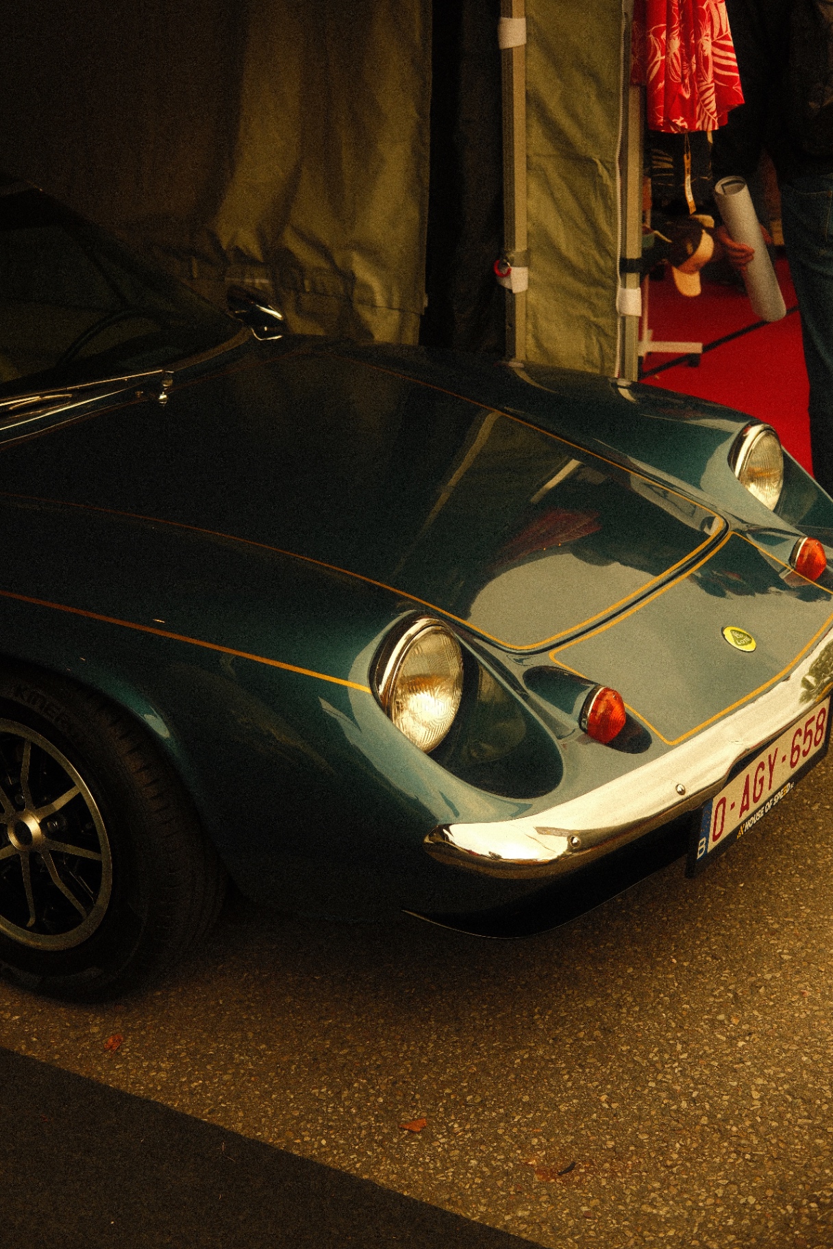 British racing green Lotus Elan at night