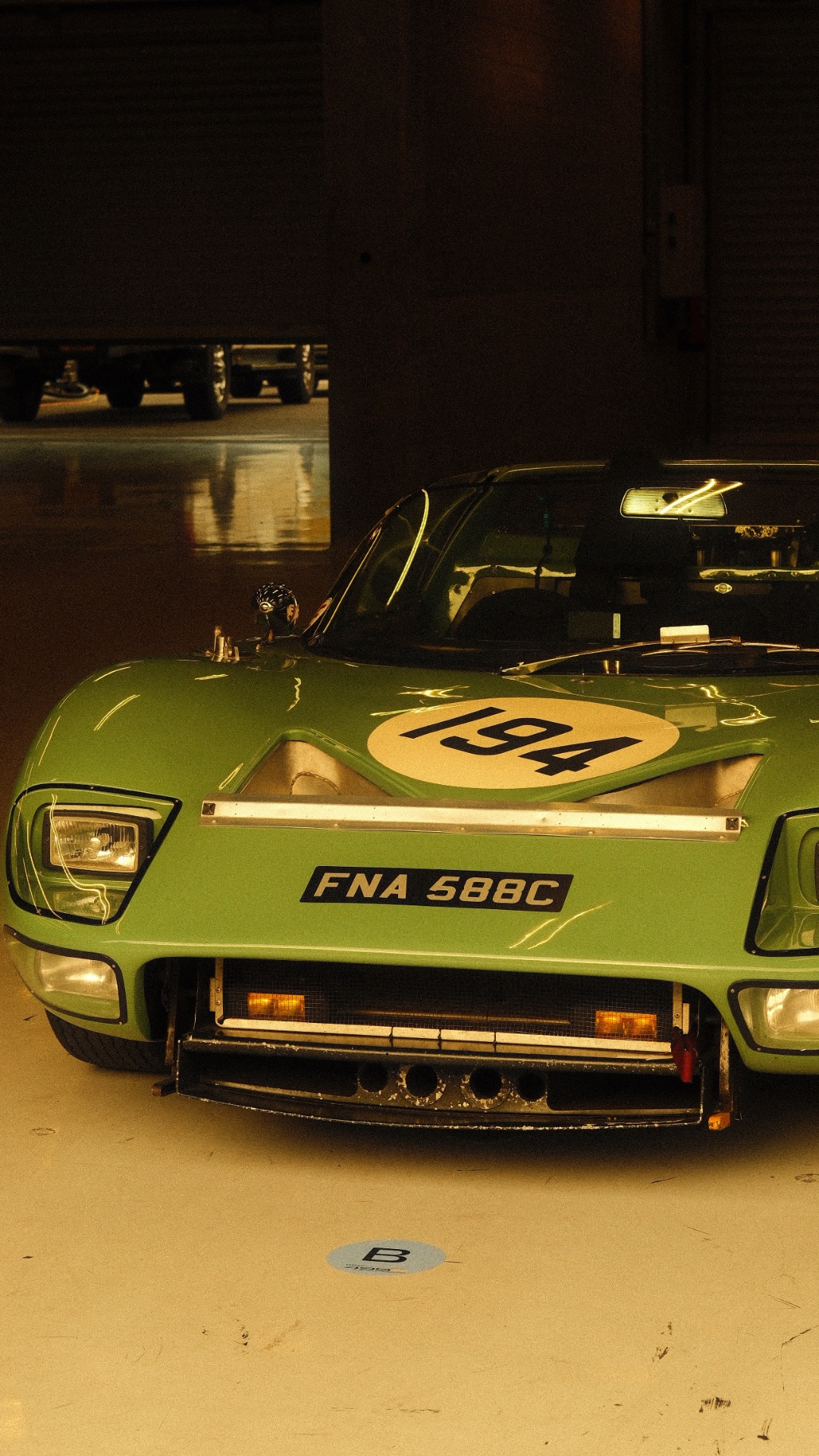 Mint green GT40 race car front-on