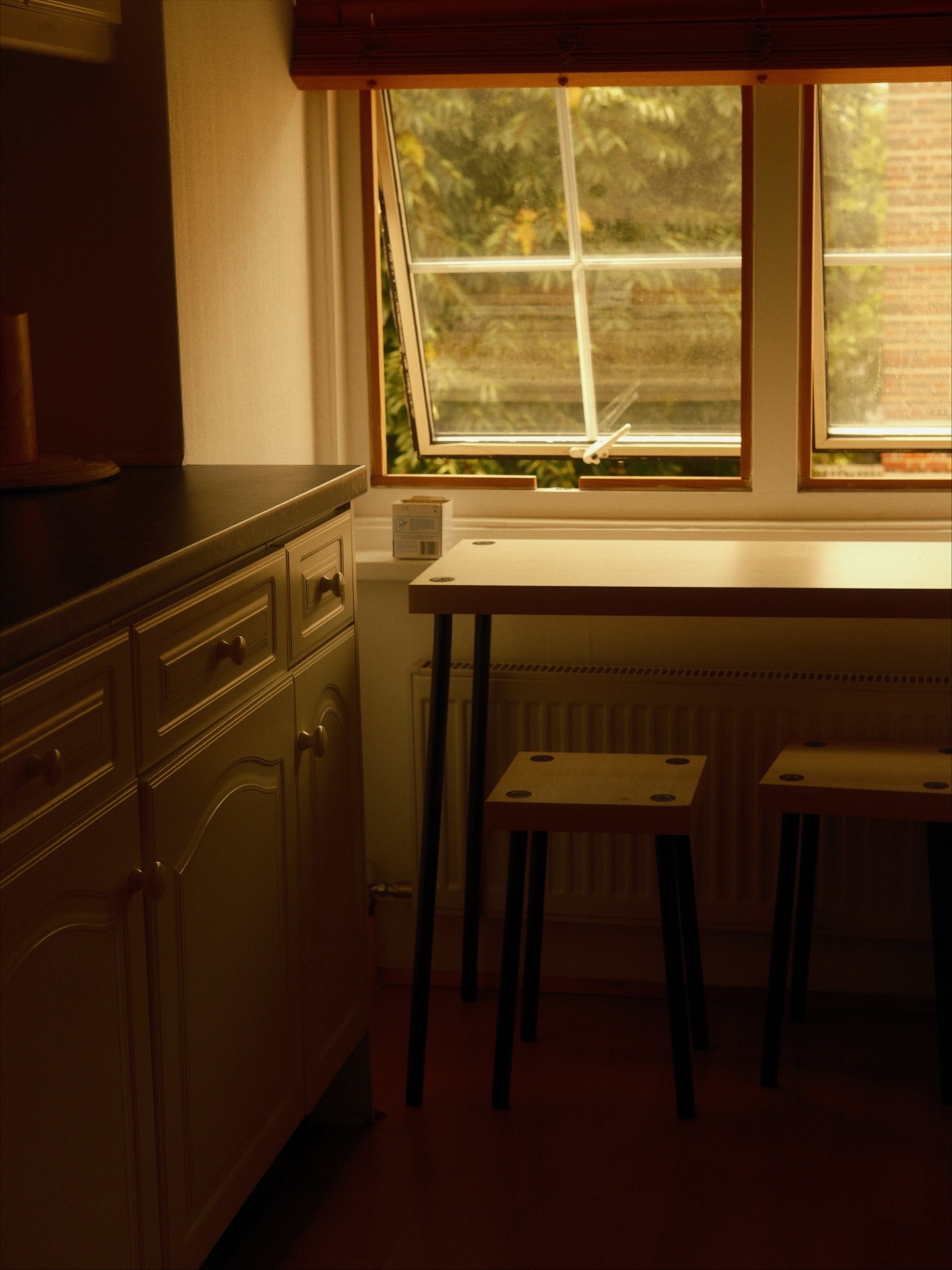 Kitchen with tilted window